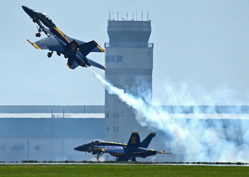 The U.S. Navy Flight Demonstration Team, the Blue Angels, perform in Wichita, Kansas at the Frontiers In Flight Air Show.