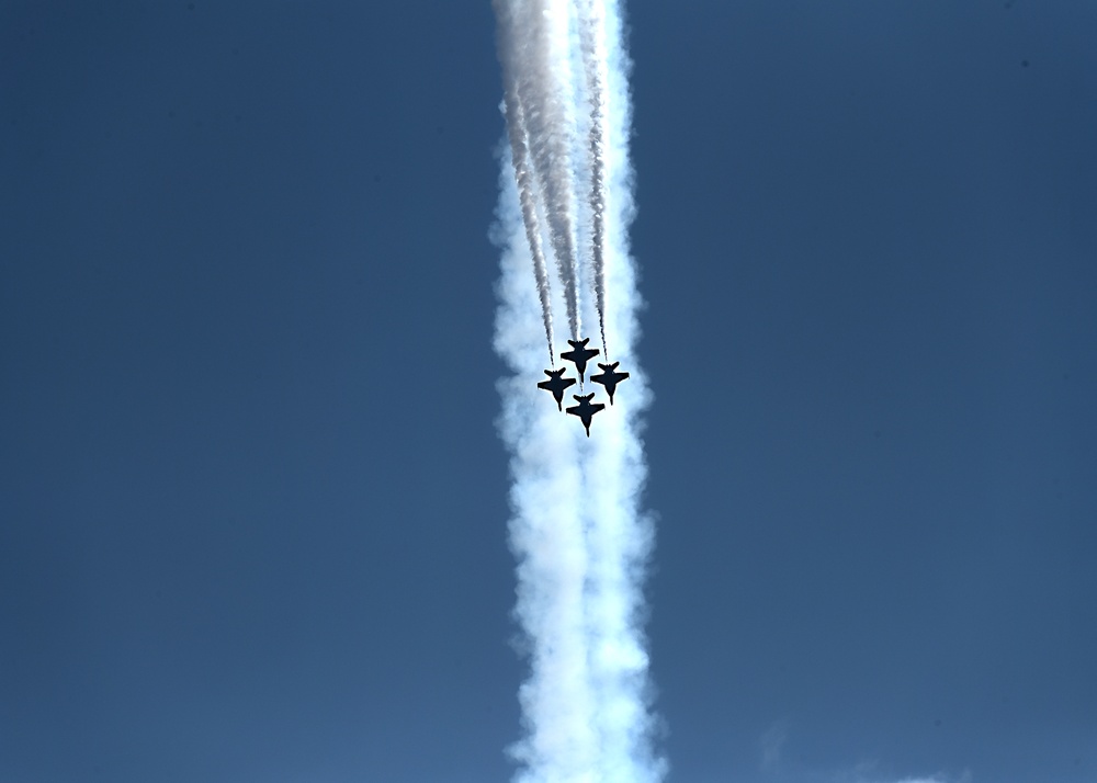 The U.S. Navy Flight Demonstration Team, the Blue Angels, perform in Wichita, Kansas at the Frontiers In Flight Air Show.