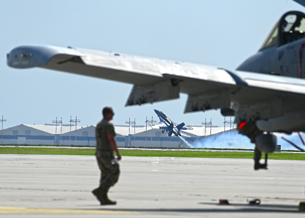 The U.S. Navy Flight Demonstration Team, the Blue Angels, perform in Wichita, Kansas at the Frontiers In Flight Air Show.