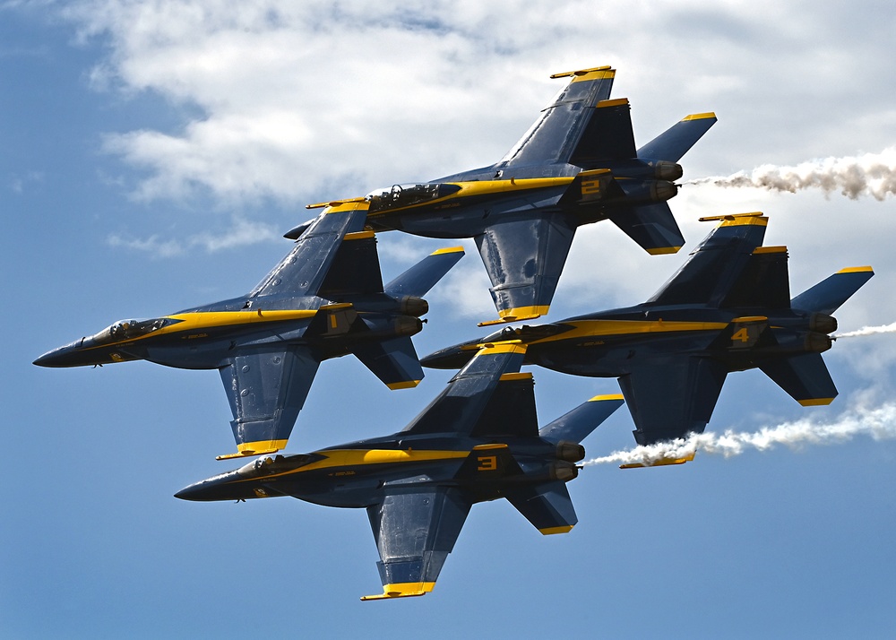 The U.S. Navy Flight Demonstration Team, the Blue Angels, perform in Wichita, Kansas at the Frontiers In Flight Air Show.