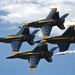 The U.S. Navy Flight Demonstration Team, the Blue Angels, perform in Wichita, Kansas at the Frontiers In Flight Air Show.