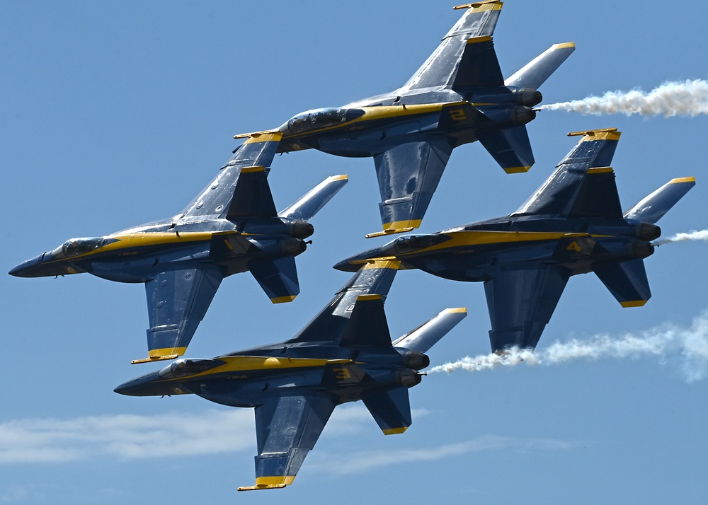 The U.S. Navy Flight Demonstration Team, the Blue Angels, perform in Wichita, Kansas at the Frontiers In Flight Air Show.