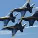 The U.S. Navy Flight Demonstration Team, the Blue Angels, perform in Wichita, Kansas at the Frontiers In Flight Air Show.