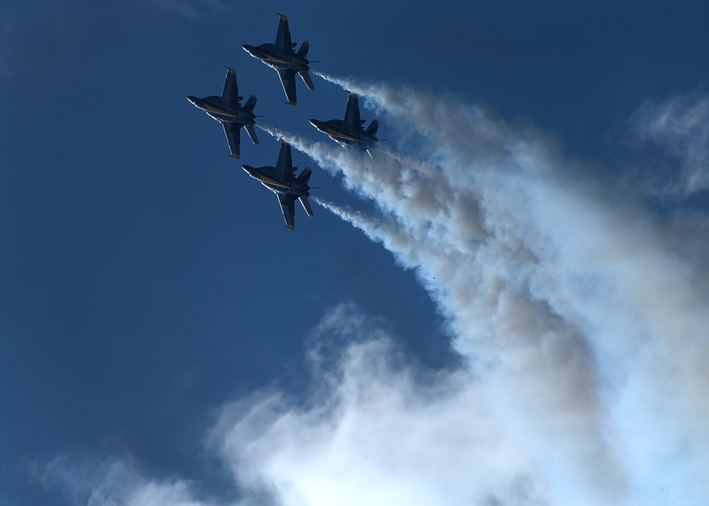 The U.S. Navy Flight Demonstration Team, the Blue Angels, perform in Wichita, Kansas at the Frontiers In Flight Air Show.