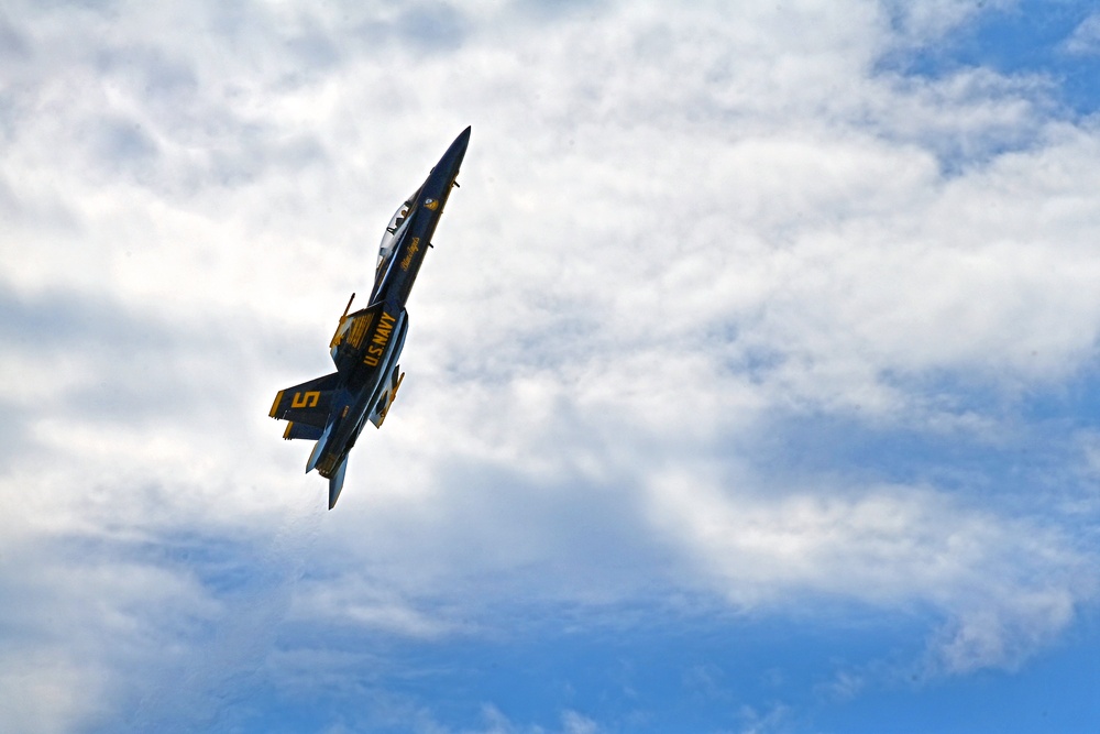 The U.S. Navy Flight Demonstration Team, the Blue Angels, perform in Wichita, Kansas at the Frontiers In Flight Air Show.