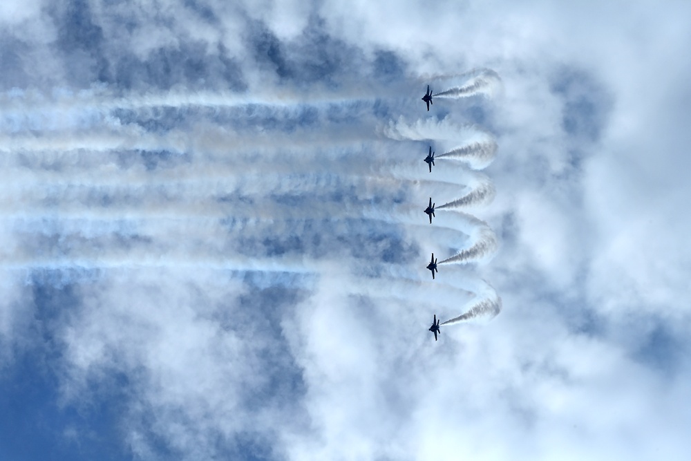 The U.S. Navy Flight Demonstration Team, the Blue Angels, perform in Wichita, Kansas at the Frontiers In Flight Air Show.