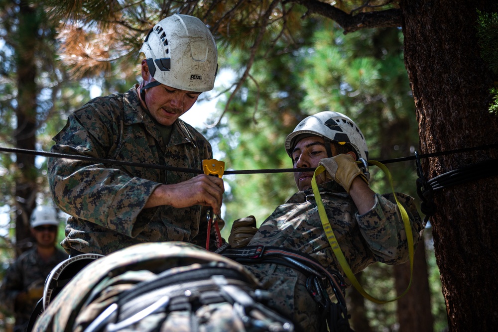 Marines with 2nd Battalion, 1st Marine Regiment practice setting up one rope bridges