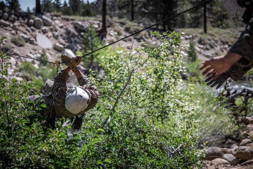 Marines with 2nd Battalion, 1st Marine Regiment practice setting up one rope bridges