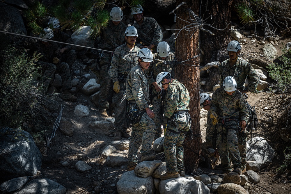 Marines with 2nd Battalion, 1st Marine Regiment practice setting up one rope bridges