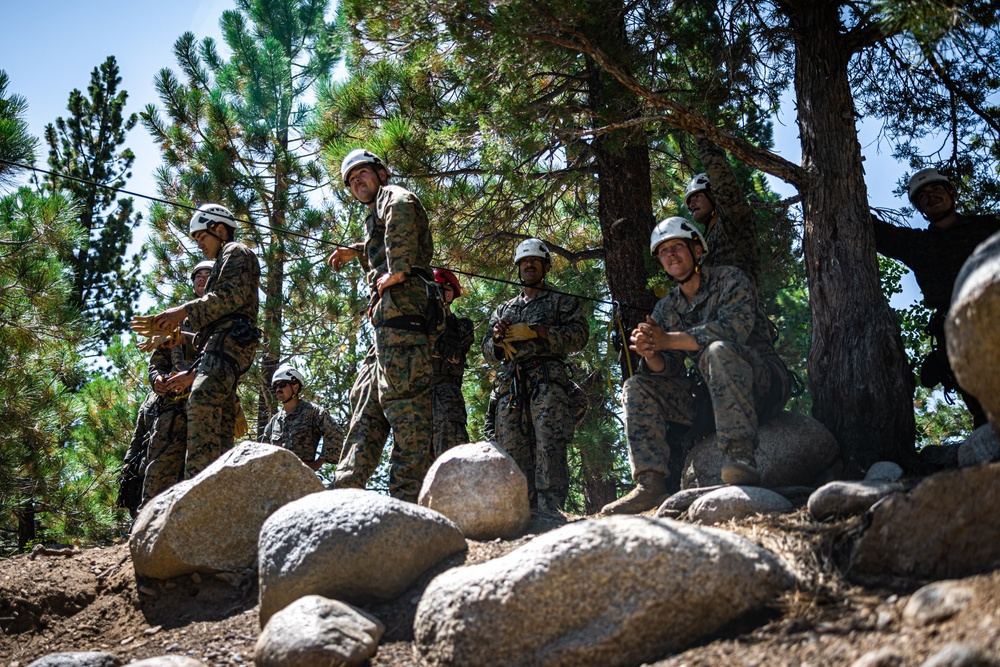 Marines with 2nd Battalion, 1st Marine Regiment practice setting up one rope bridges