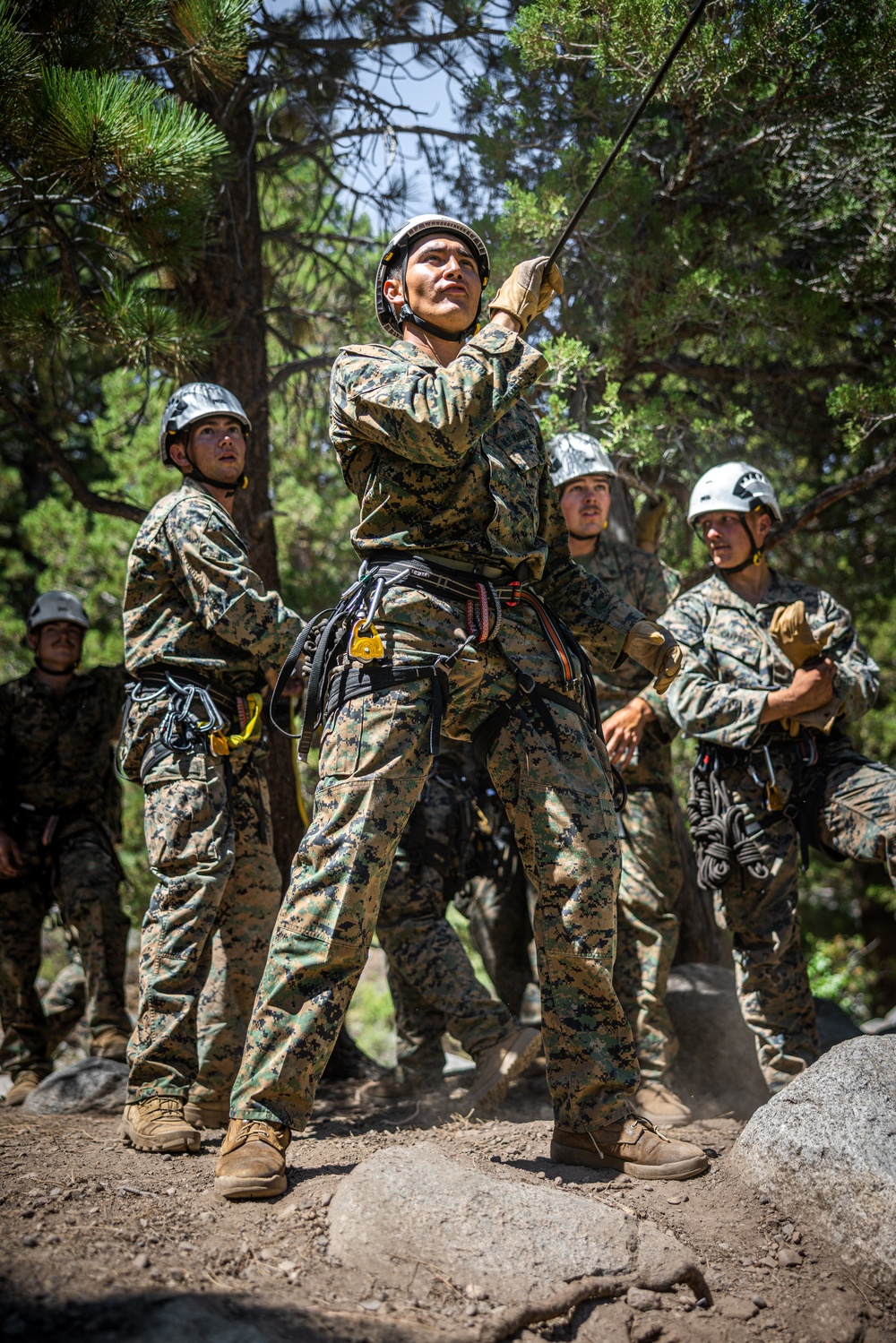 Marines with 2nd Battalion, 1st Marine Regiment practice setting up one rope bridges