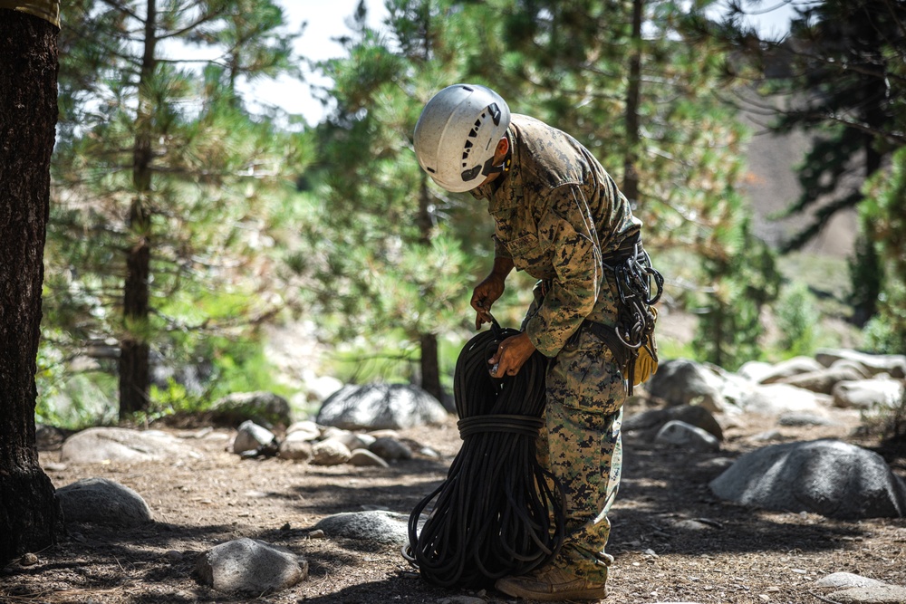 Marines with 2nd Battalion, 1st Marine Regiment practice setting up one rope bridges