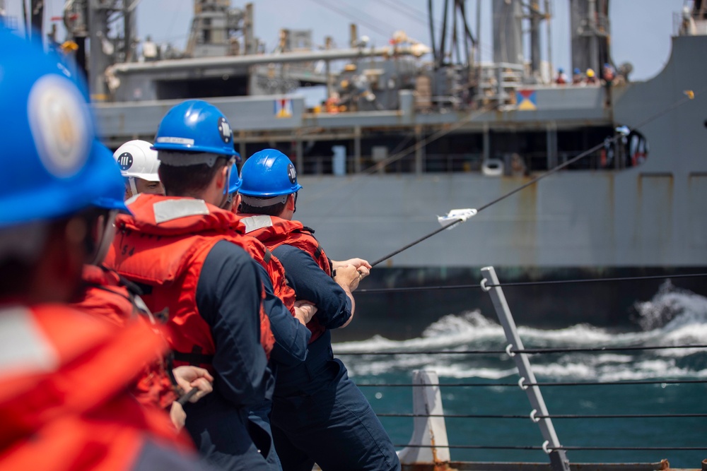USS Spruance conducts replenishment-at-sea with USNS Big Horn