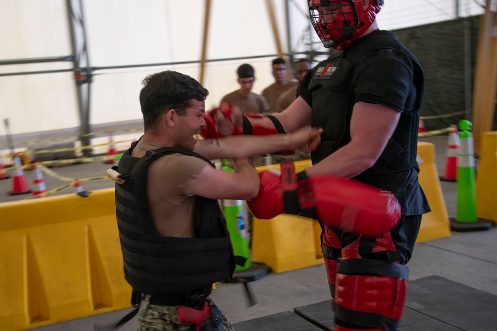 USS Tripoli Sailors Get OC spray