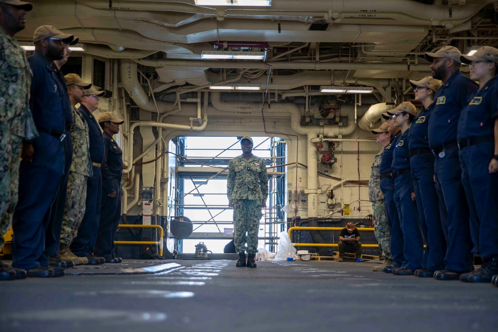 HM2 Kamala Reid-Allen Departs USS Tripoli (LHA 7)