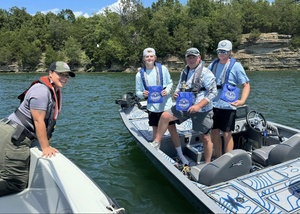 Coast Guard rescues 3 people after boat capsizes 15 miles west of Bayport