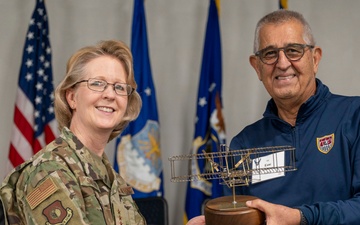 Lt. Gen. Donna Shipton Presents Award To Soccer Referee Esse Baharmast