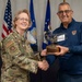 Lt. Gen. Donna Shipton Presents Award To Soccer Referee Esse Baharmast