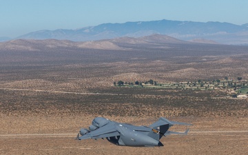 Two C-17s Fly Formation Over Edwards AFB