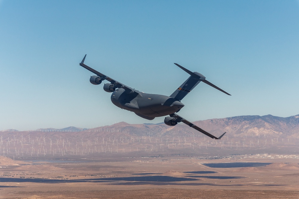 Two C-17s Fly Formation Over Edwards AFB