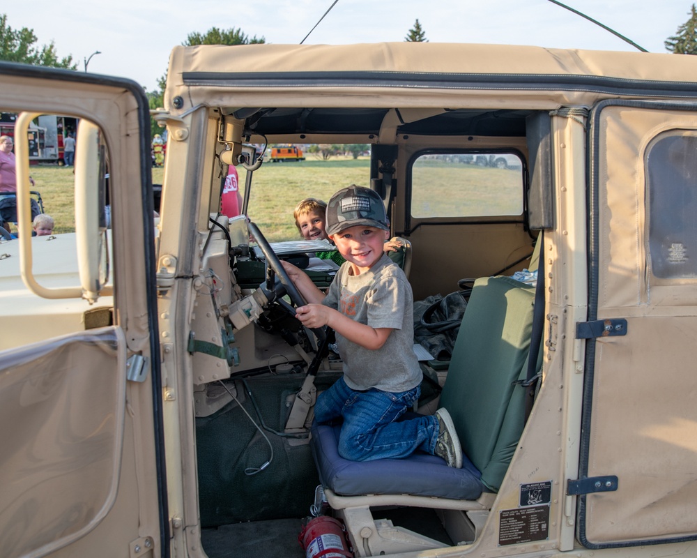 Families explore vehicles at National Night Out