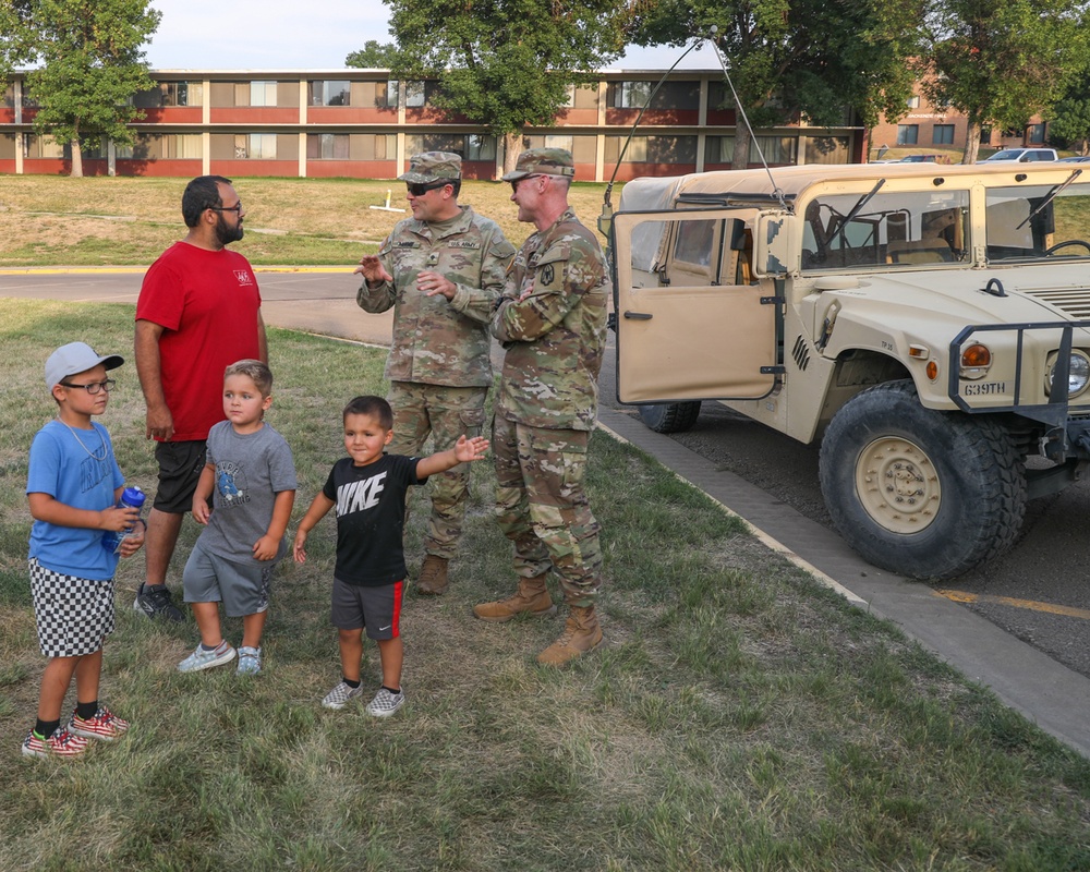 Families explore vehicles at National Night Out