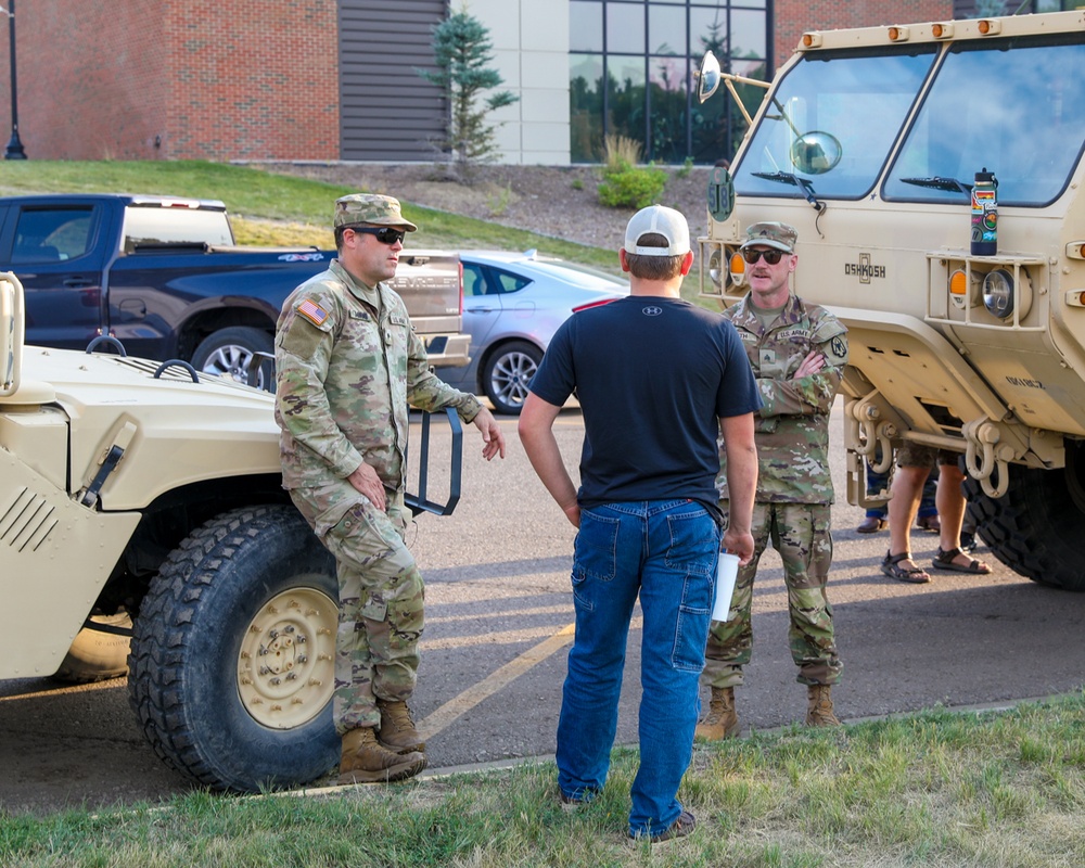 Families explore vehicles at National Night Out