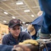 USS George Washington (CVN 73) Sailors practice pipe patching during damage control training