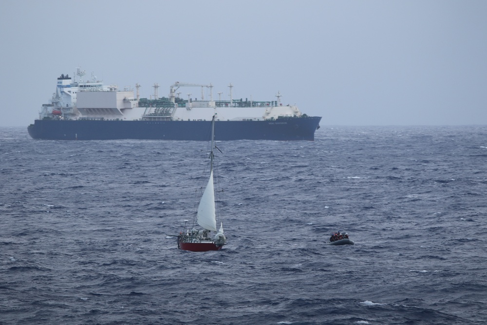 Coast Guard, Navy rescue woman, child, pets from sailboat beset by weather 925 miles off Honolulu