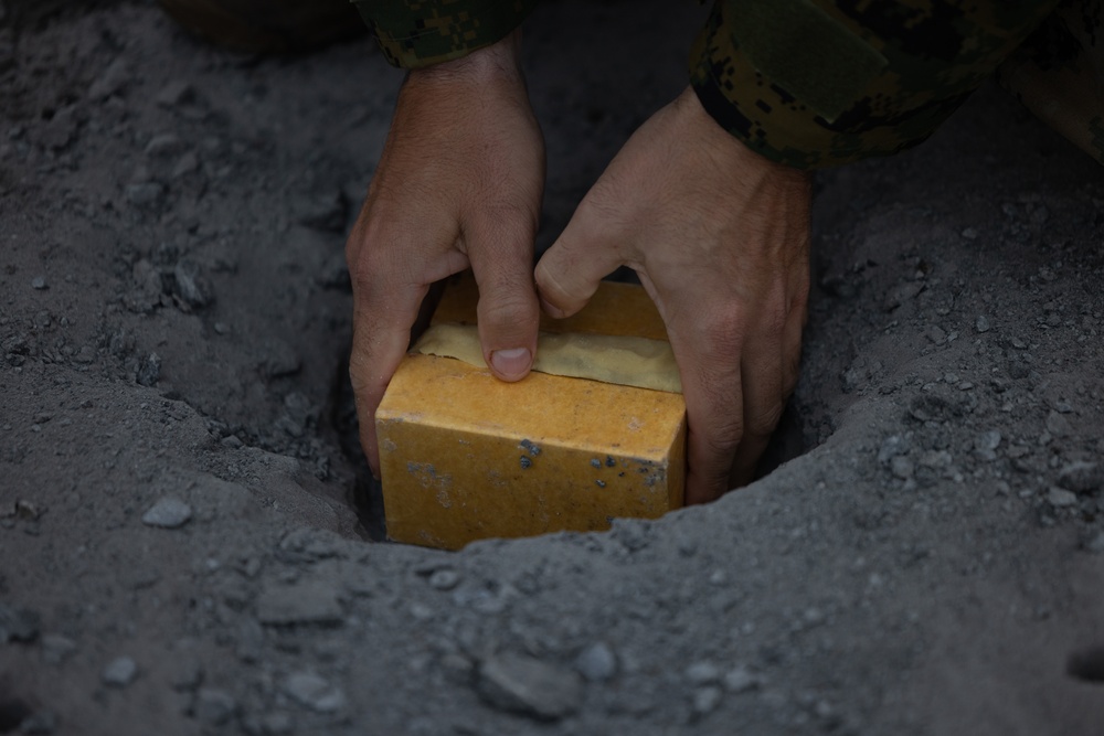 MWSS-271 EOD make craters with Icelandic coast guard during Exercise Northern Viking 24