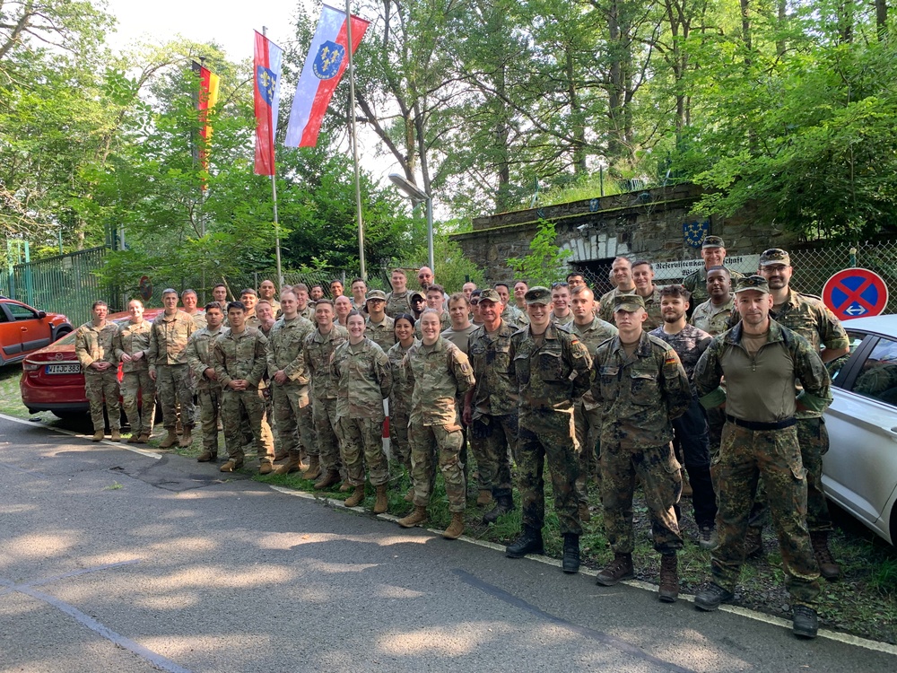 US Army Soldiers march with German allies for proficiency badge