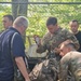 US Army Soldiers march with German allies for proficiency badge