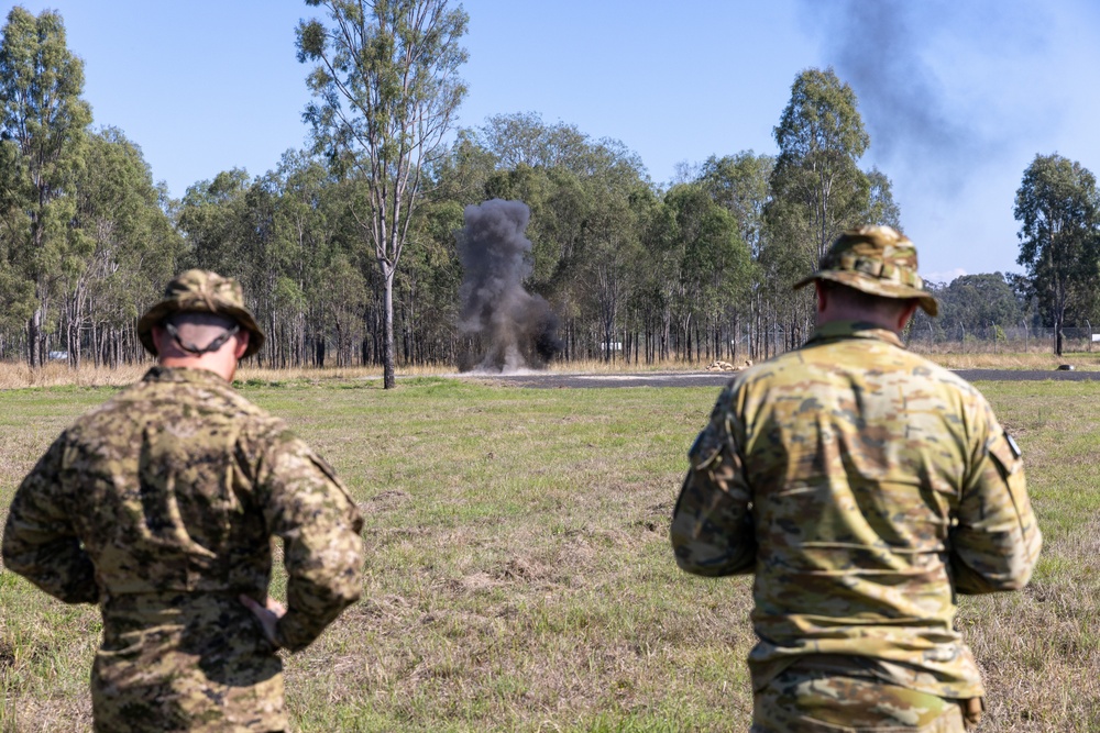 Team of joint multinational service members conducts simulated live explosive disposal training during Operation Render Safe 24