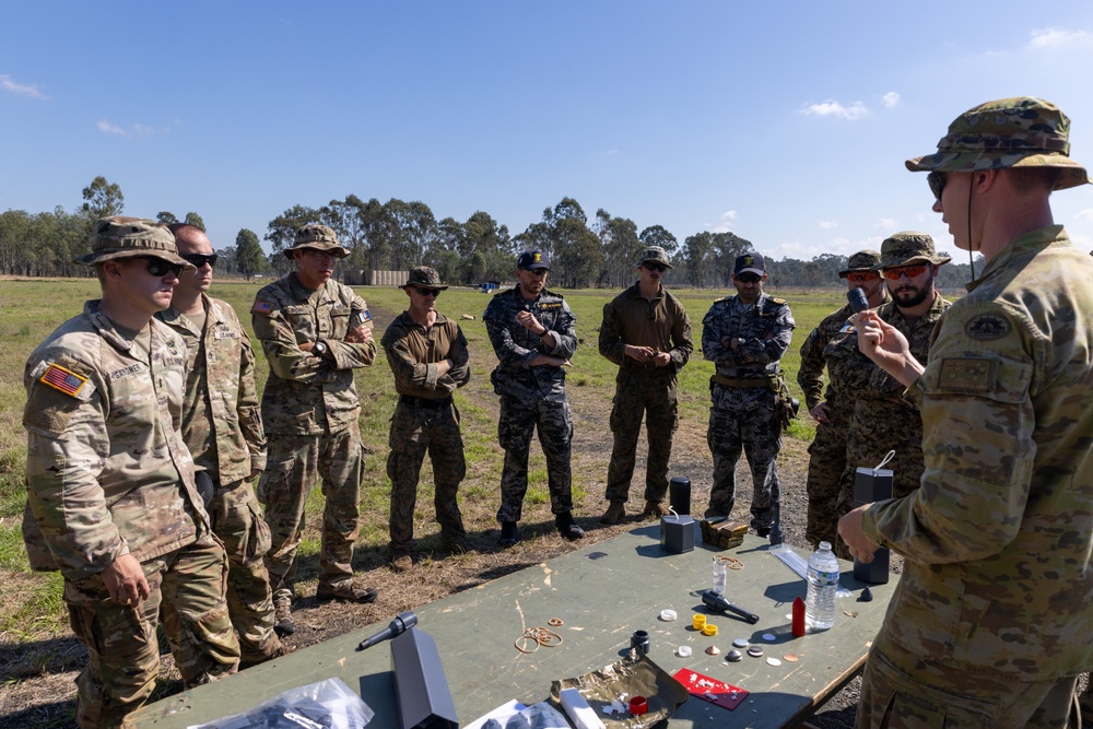 Team of joint multinational service members conducts simulated live explosive disposal training during Operation Render Safe 24