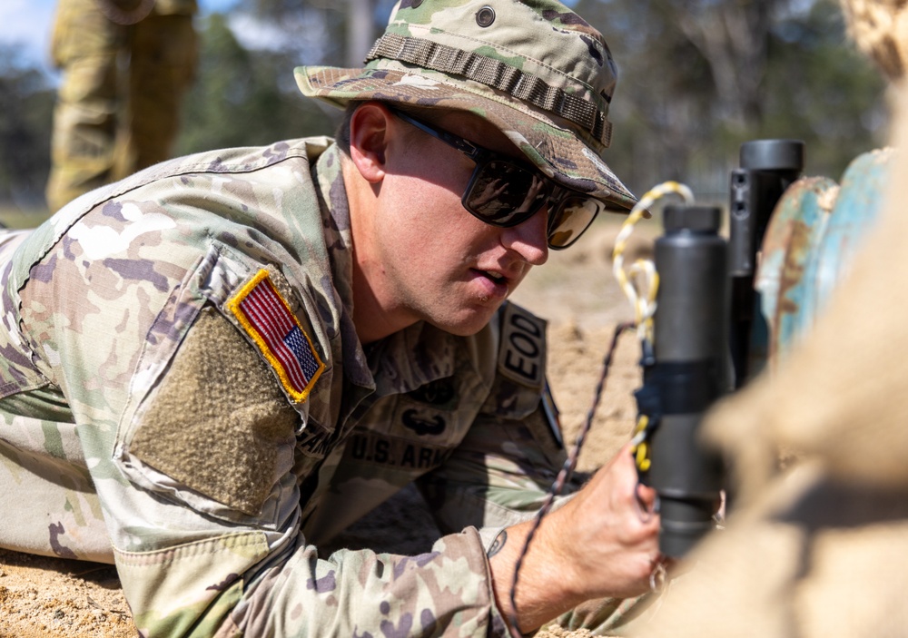 Team of joint multinational service members conducts simulated live explosive disposal training during Operation Render Safe 24