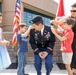 LTC. Donald K. Lew's family pins on his new rank.