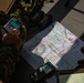 Members of the Japan Self Defense Force calculate and plot points for air support while training with U.S. Air Force Tactical Air Control Party during Super Garuda Shield 2024