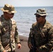 U.S. Marines Capt. Nathaniel Armendariz briefs U.S. Army Brig. Gen. Kevin J. Williams on the amphibious landing training during Super Garuda Shield 2024