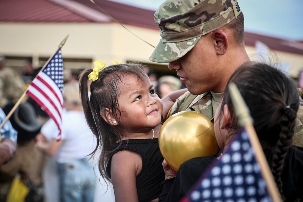 Families welcome home deployed Guam Guard Soldiers