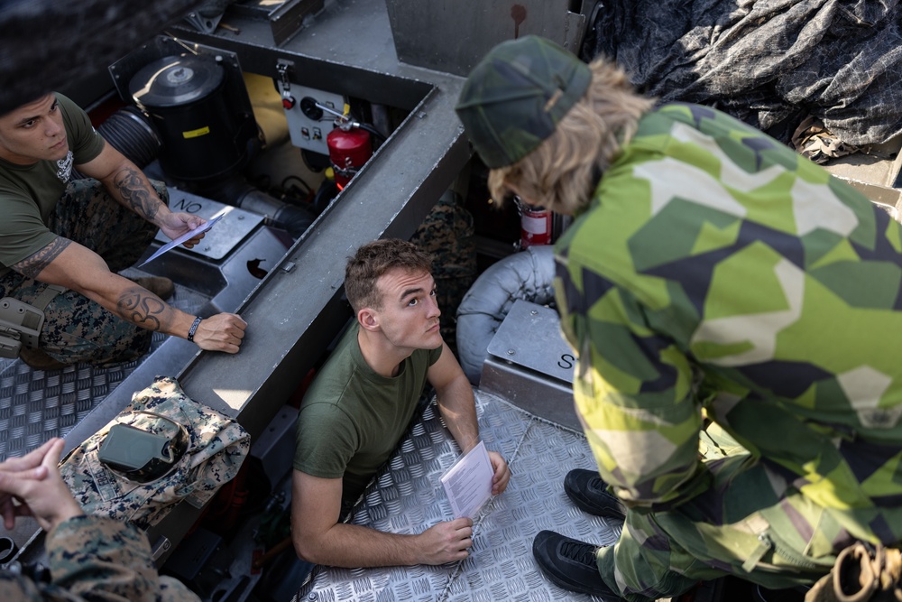 U.S. Marines conduct pre-operation training aboard Swedish combat boats