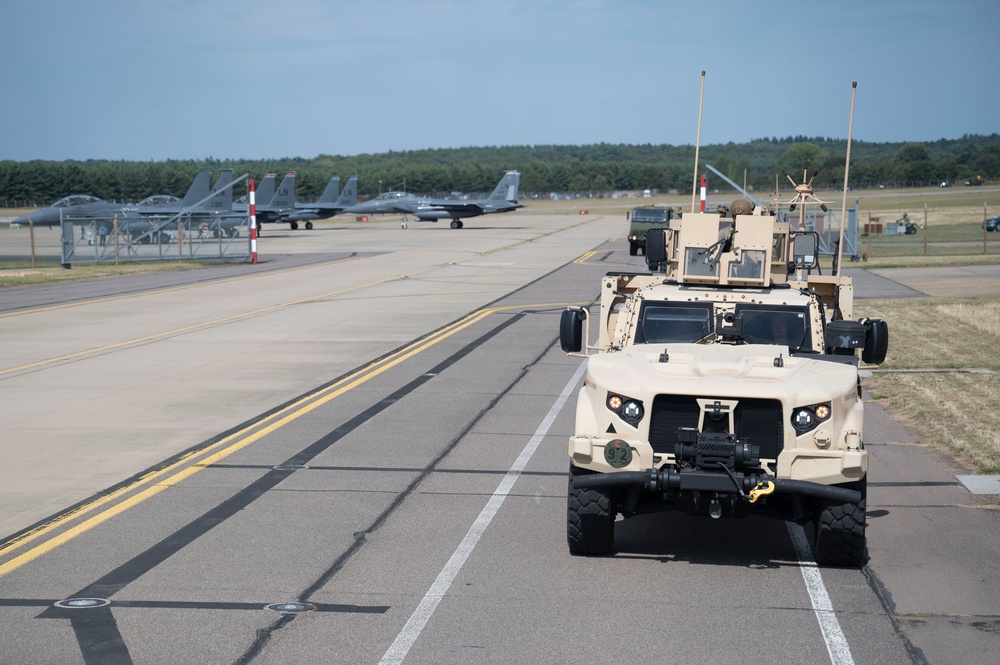 Liberty Wing Defenders train base defense procedures with JLTVs