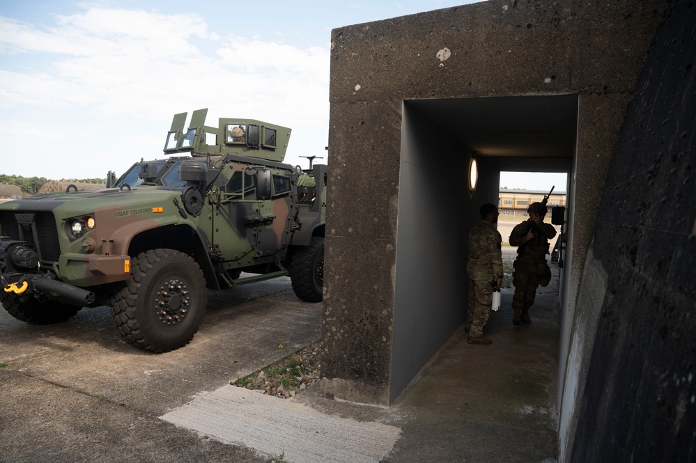 Liberty Wing Defenders train base defense procedures with JLTVs