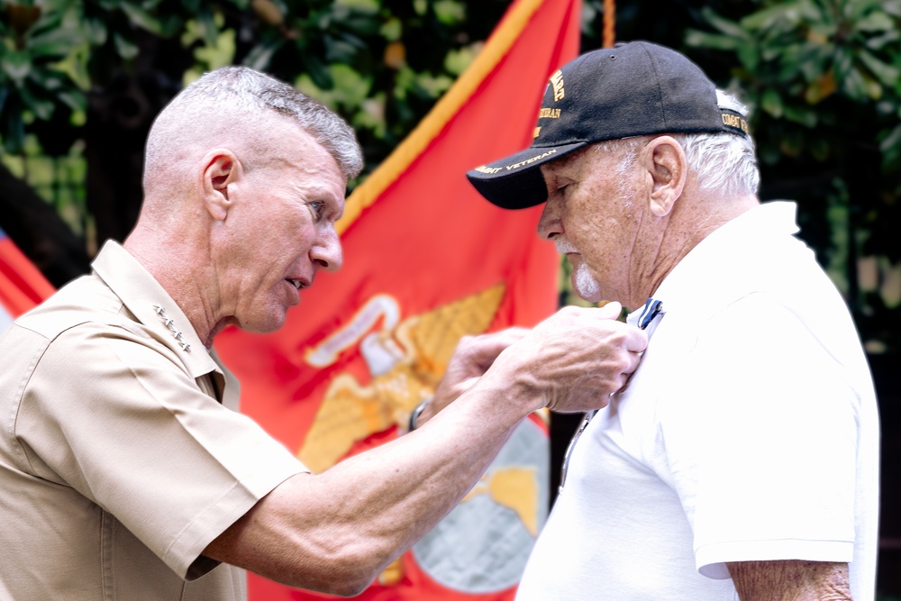 Commandant, Gen. Smith, Presents Cpl. Heller with Navy Cross