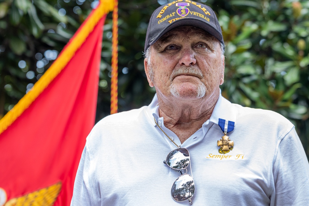 Commandant, Gen. Smith, Presents Cpl. Heller with Navy Cross