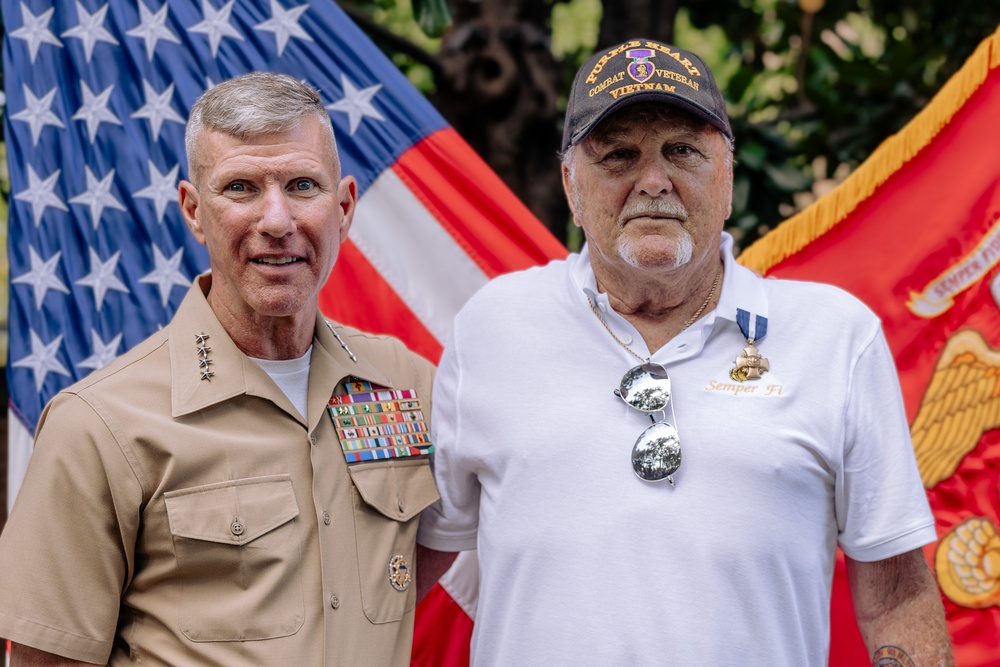Commandant, Gen. Smith, Presents Cpl. Heller with Navy Cross