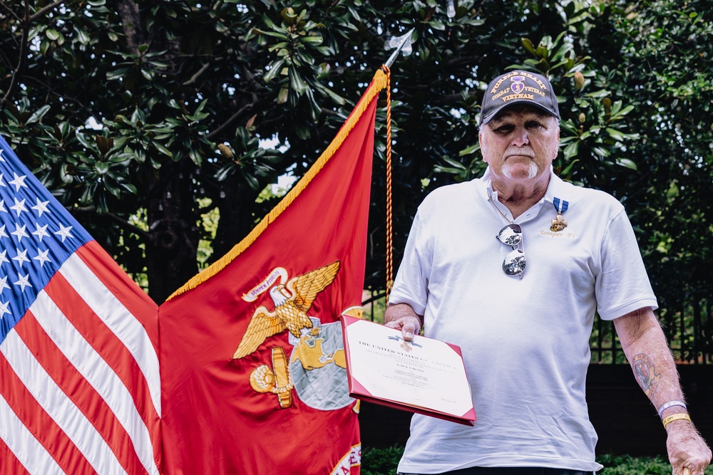 Commandant, Gen. Smith, Presents Cpl. Heller with Navy Cross