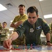 Dover AFB Airmen practice readiness during C2C strategy game