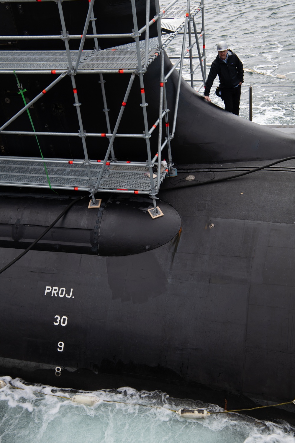 Sailors Aboard USS Hawaii Perform Bridal Blow During STMP at HMAS Stirling