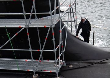 Sailors Aboard USS Hawaii Perform Bridal Blow During STMP at HMAS Stirling