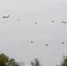 Multinational service members parachute from C-130J Super Hercules during Super Garuda Shield 2024